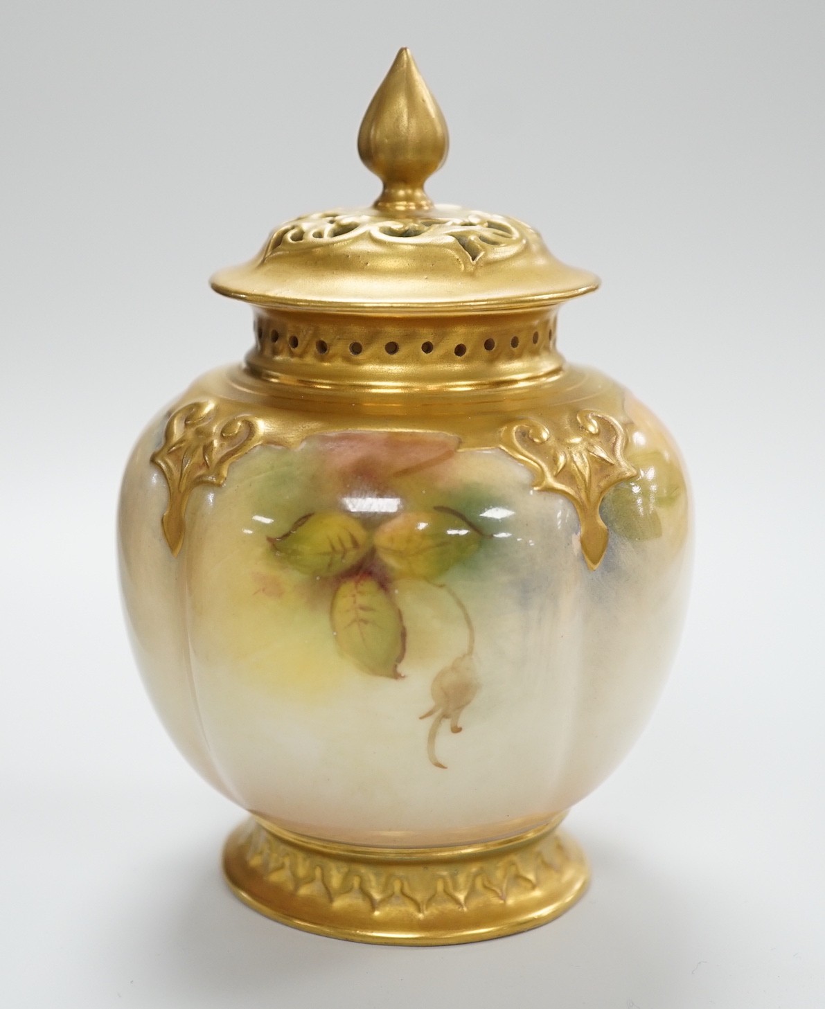 A Royal Worcester pink rose painted pot pourri vase and cover. 14cm tall